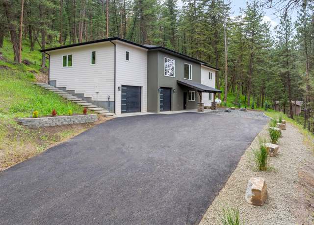 Property at 1191 Big Flat Rd, Missoula, MT 59804, 4 beds, 3 baths