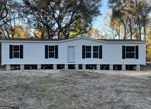 Property at 7191 NW 165 St, Gilchrist, FL 32693, 4 beds, 2 baths