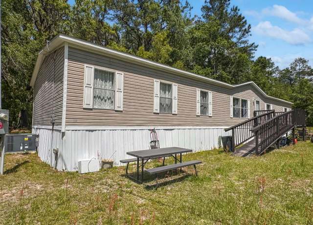Property at 11588 SE Cr 245, Lulu, FL 32601, 4 beds, 2 baths