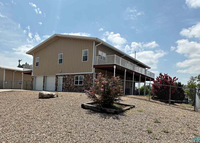 Property at 514 W 11th St, Roswell, NM 88201, 4 beds, 3 baths
