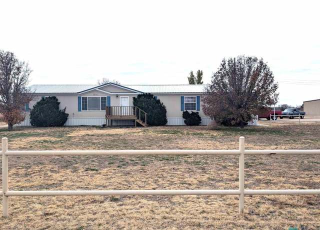 Property at 1001 W Spruce St, Portales, NM 88130, 3 beds, 2 baths