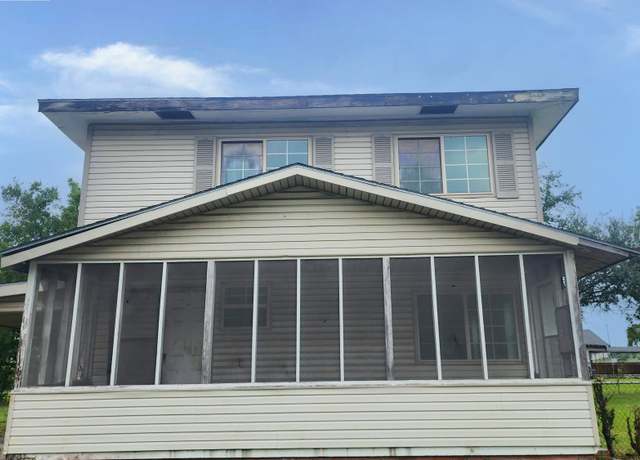 Property at 1311 W 11th St, Port Arthur, TX 77640, 4 beds, 3 baths