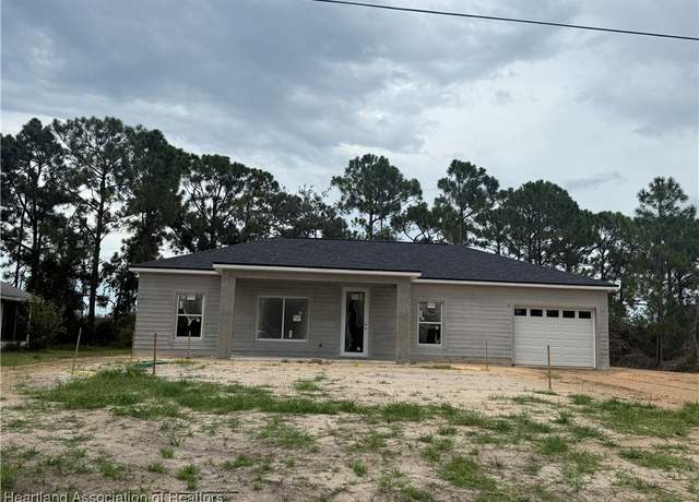 Property at 1256 Washington Blvd NE, Lake Placid, FL 33852, 3 beds, 2.5 baths