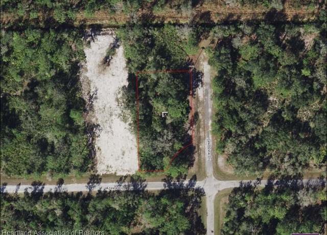 Property at 1002 Azalea Dr, Indian Lake Estates, FL 33855