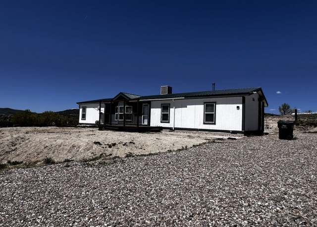 Property at 854 Spring Valley Pkwy, Spring Creek, NV 89815, 4 beds, 2 baths