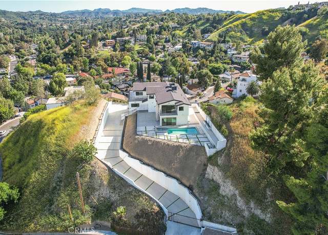 Property at 5099 Llano Dr, Woodland Hills, CA 91364, 5 beds, 5 baths