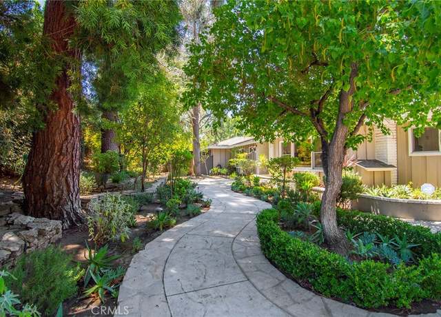 Property at 4809 Hasekian Dr, Tarzana, CA 91356, 4 beds, 5 baths