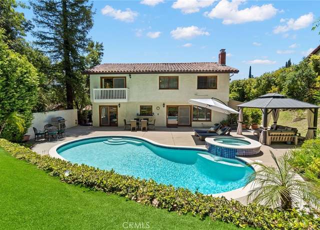 Property at 10411 Windtree Dr, Los Angeles, CA 90077, 4 beds, 3 baths