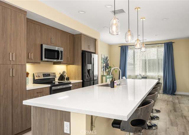 Property at 9916 Artesia Blvd #405, Bellflower, CA 90706, 3 beds, 3 baths