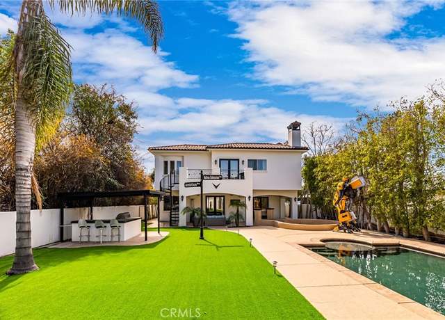 Property at 23123 Oxnard St, Woodland Hills, CA 91367, 5 beds, 6 baths