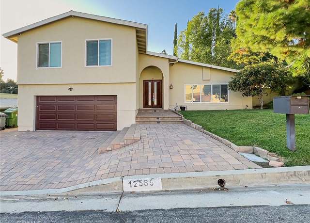 Property at 12585 Byron Ave, Granada Hills, CA 91344, 4 beds, 3 baths