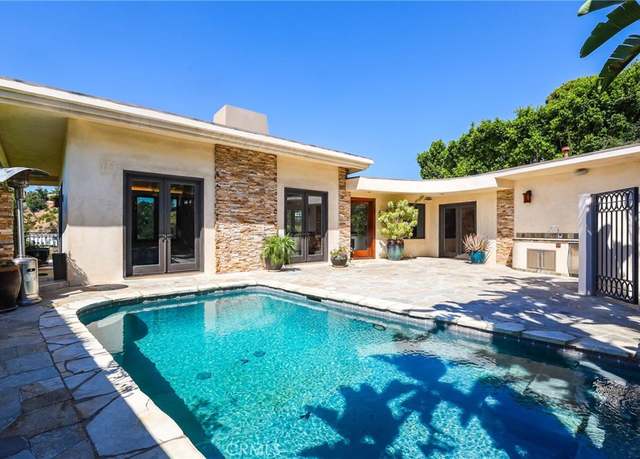 Property at 1667 Waynecrest Dr, Beverly Hills, CA 90210, 3 beds, 3.5 baths