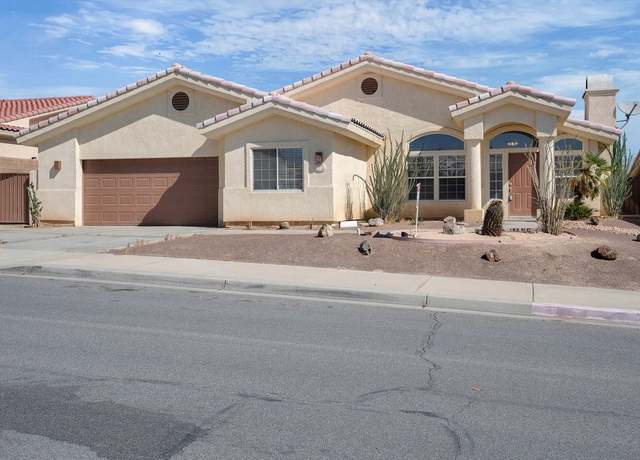 Property at 74080 Scholar Ln W, Palm Desert, CA 92211, 4 beds, 2 baths