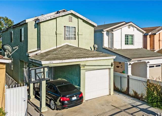 Property at 13214 S Main St, Los Angeles, CA 90061, 4 beds, 2 baths