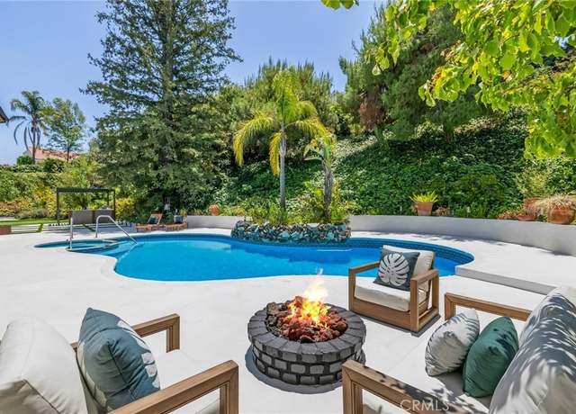 Property at 20101 Greenbriar Dr, Tarzana, CA 91356, 5 beds, 4 baths