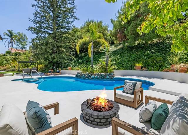 Property at 20101 Greenbriar Dr, Tarzana, CA 91356, 5 beds, 4 baths