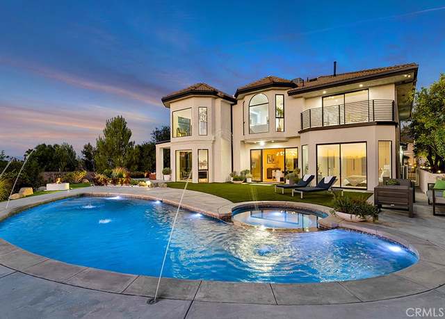 Property at 4015 Clarinda Dr, Tarzana, CA 91356, 5 beds, 4 baths