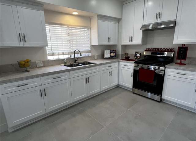 Property at 1449--1451 W 45th St, Los Angeles, CA 90062, 4 beds, 2 baths