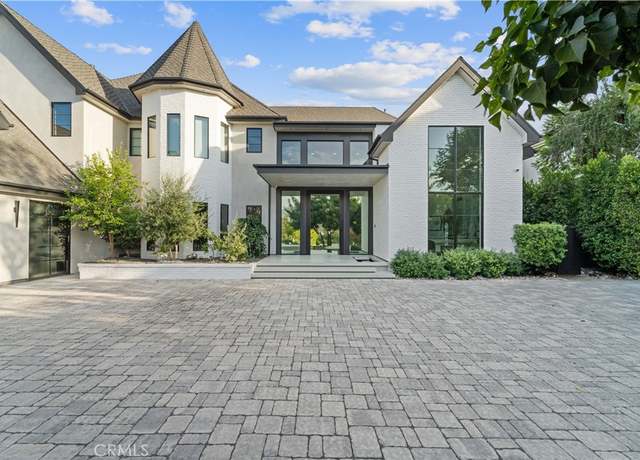 Property at 20620 Chatsboro Dr, Woodland Hills, CA 91364, 7 beds, 10 baths