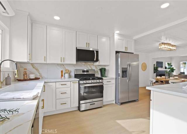 Property at 4036 Denker Ave, Los Angeles, CA 90062, 3 beds, 2 baths