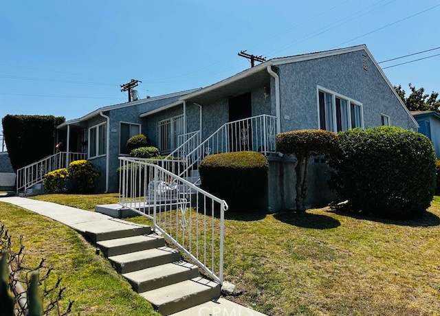 Property at 9506 S Manhattan Pl, Los Angeles, CA 90047, 4 beds, 2 baths