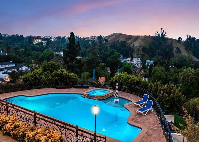Property at 22470 Sueno Rd, Woodland Hills, CA 91364, 6 beds, 7 baths