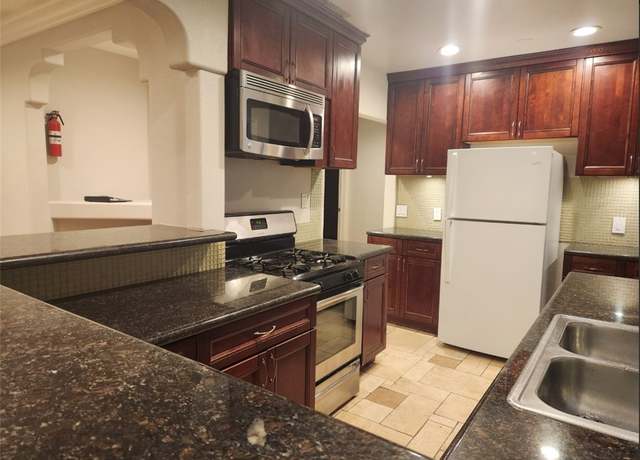 Property at 21057 Runnymede St, Canoga Park, CA 91303, 3 beds, 2 baths