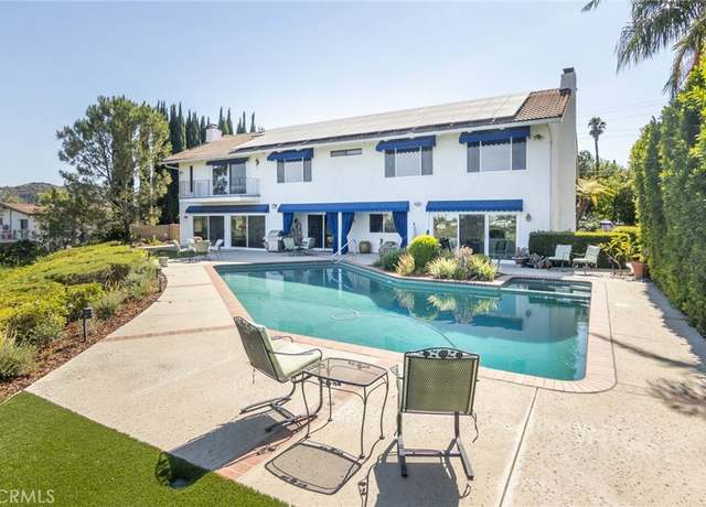 Property at 5004 Del Moreno Dr, Woodland Hills, CA 91364, 5 beds, 5 baths