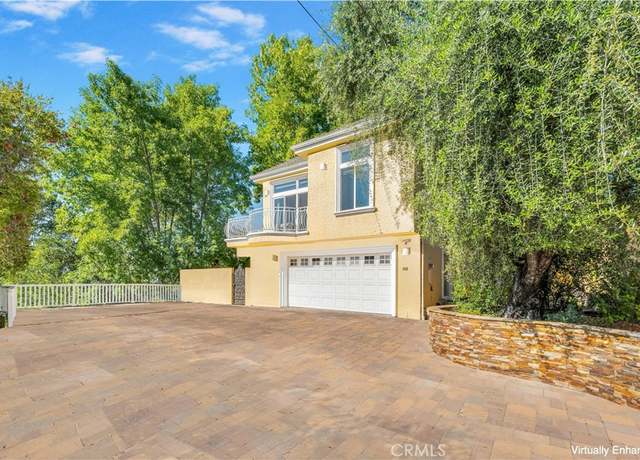 Property at 6018 Fenwood Ave, Woodland Hills, CA 91367, 4 beds, 4 baths