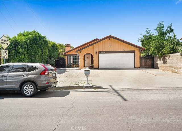 Property at 21050 Community St, Canoga Park, CA 91304, 4 beds, 2 baths