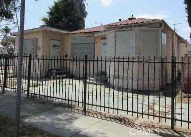 Property at 9715 S Hoover St, Los Angeles, CA 90044, 4 beds, 3 baths