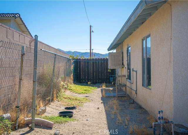 Property at 13045 La Mesa Dr, Desert Hot Springs, CA 92240, 4 beds, 2 baths