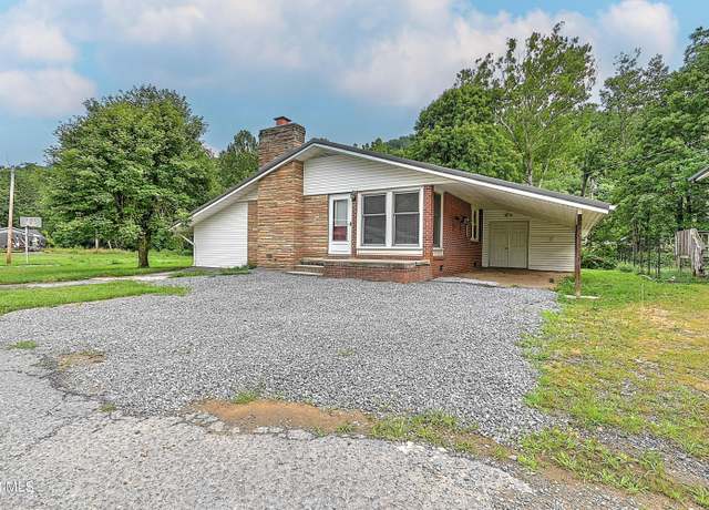 Property at 409 Heaton St, Roan Mountain, TN 37687, 4 beds, 2 baths