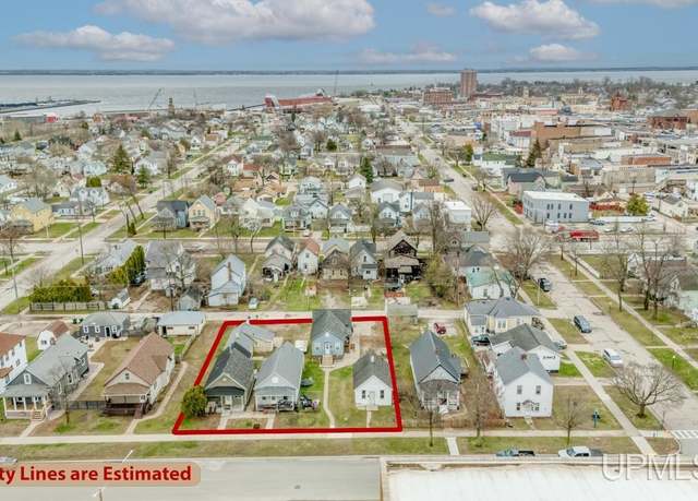 Property at 208-214 1/2 N 15th St, Escanaba, MI 49829, 10 beds, 5 baths