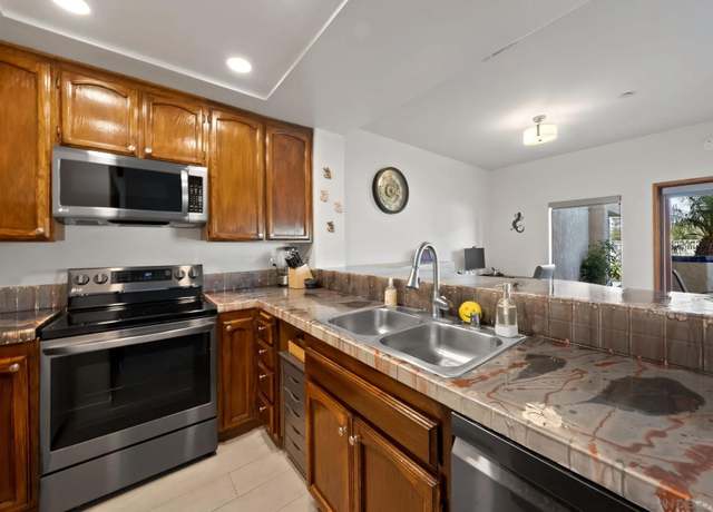 Property at 12132 Royal Birkdale Row Unit 104e, San Diego, CA 92128, 1 bed, 2 baths
