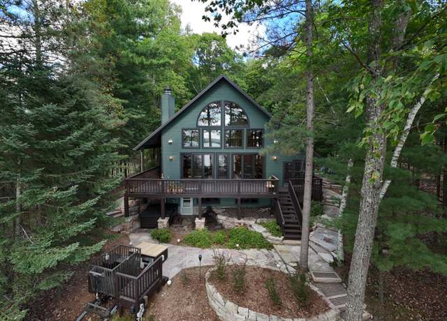 Property at 7721 Tomahawk Trl, Woodruff, WI 54568, 4 beds, 3.5 baths