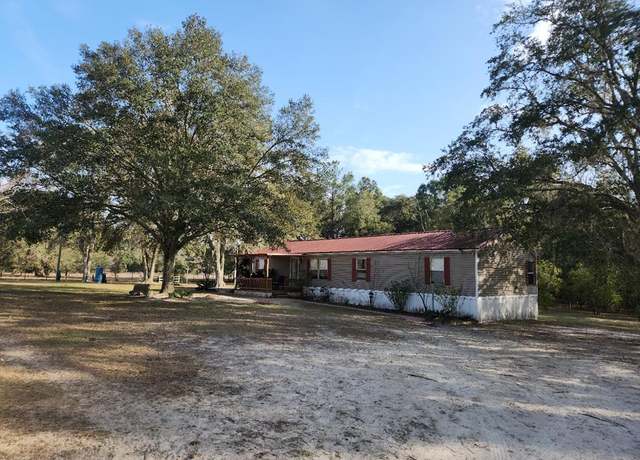 Property at 664 NE 748th Ave, Old Town, FL 32680, 4 beds, 2 baths