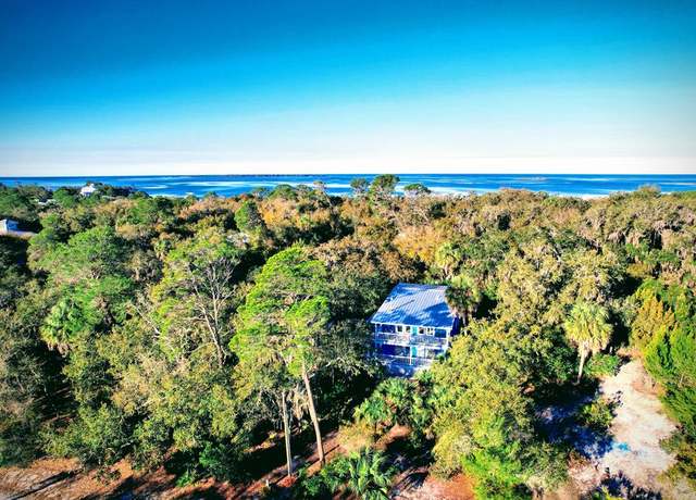 Property at 12530 Merle Ave, Cedar Key, FL 32625, 4 beds, 2.5 baths