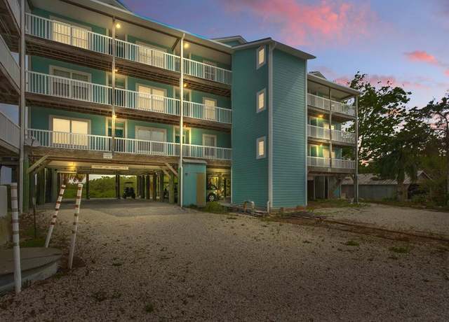 Property at 7041 Depot St, Cedar Key, FL 32625, 1 bed, 1.5 baths