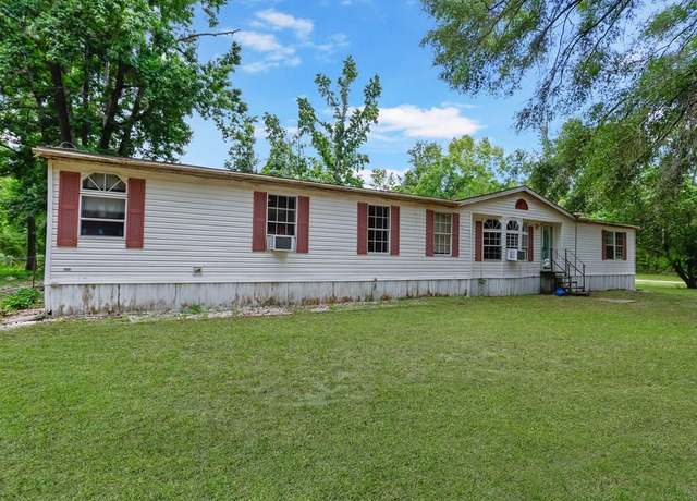 Property at 699 SW Old Lake City Ter, High Springs, FL 32655, 4 beds, 2 baths