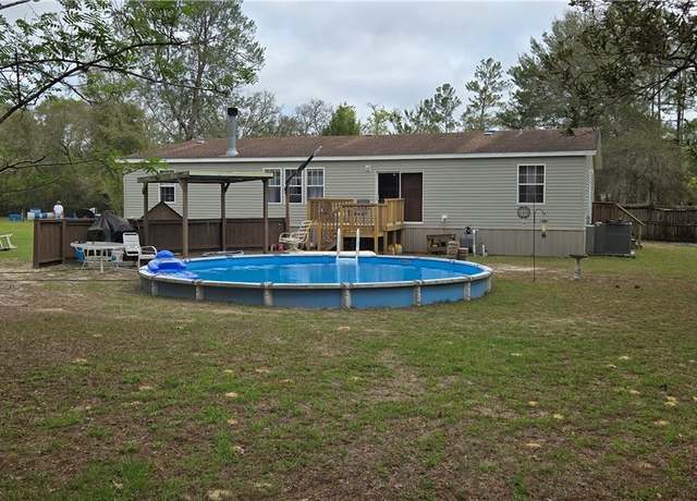 Property at 5597 W Tirana Ln, Dunnellon, FL 34433, 4 beds, 2 baths