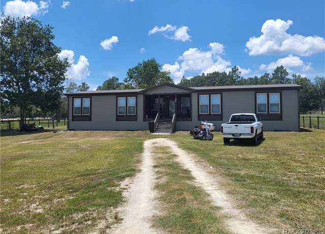 Property at 6450 SE 143rd Ct, Morriston, FL 32668, 4 beds, 3 baths