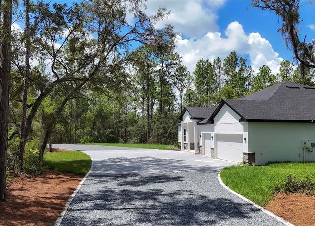 Property at 7024 N Fountainhead Dr, Citrus Springs, FL 34433, 4 beds, 3 baths