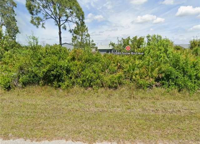 Property at 12080 Snow Bird Ave, Port Charlotte, FL 33981