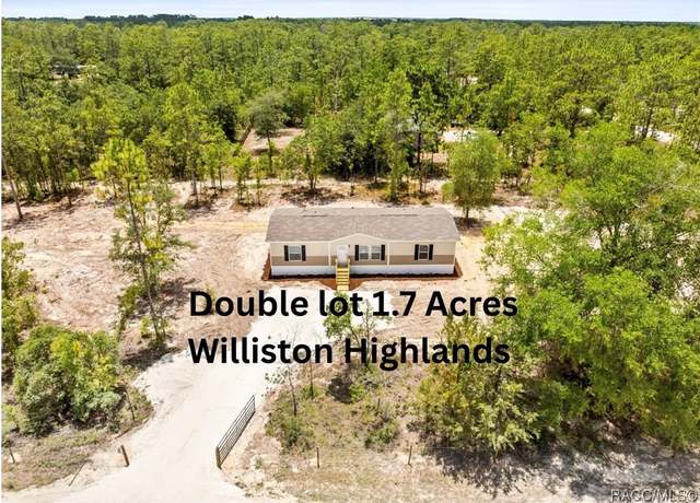 Property at 14440 SE 21st Pl, Morriston, FL 32668, 3 beds, 2 baths