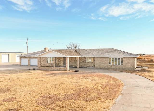 Property at 1518 N Road H, Ulysses, KS 67880, 3 beds, 4 baths