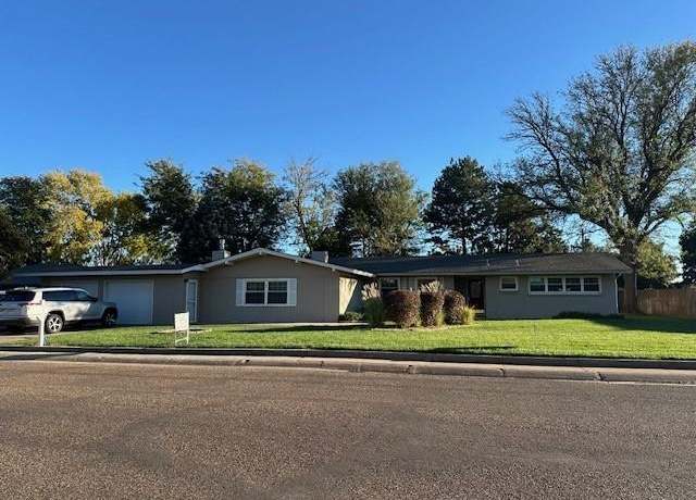 Property at 430 Lilac Dr, Liberal, KS 67901, 4 beds, 3 baths