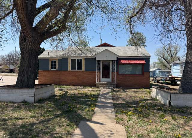 Property at 825 S Polk St, Hugoton, KS 67951, 4 beds, 2 baths
