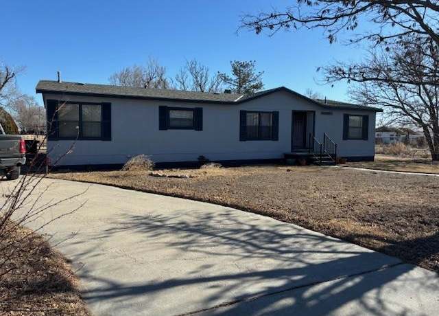 Property at 202 S 3rd St, Cimarron, KS, 3 beds, 2 baths