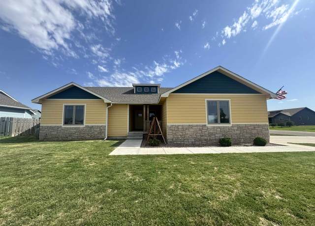 Property at 217 Vail St, Dodge City, KS 67801, 4 beds, 3 baths